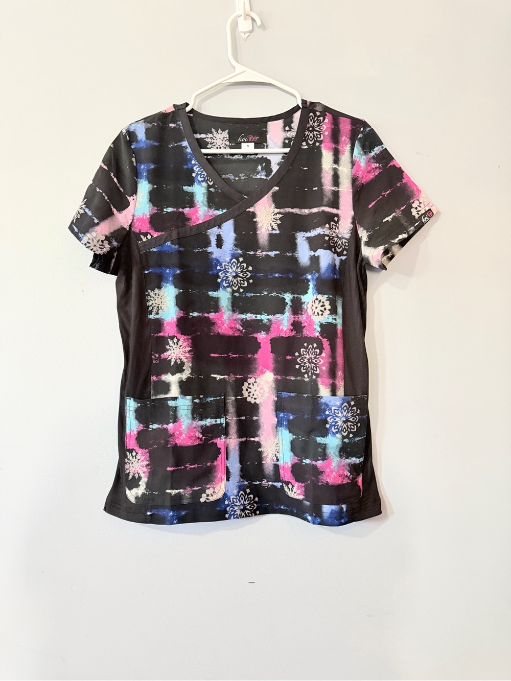 Koi lite Women’s Black V-Neck Printed Scrub Top with Pink & Blue Accents